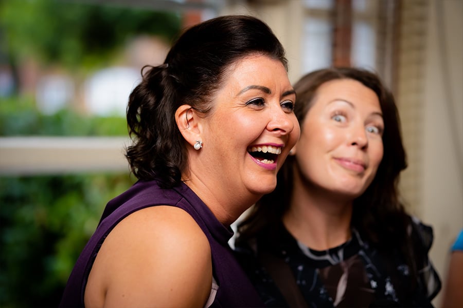 woman having fun at karaoke wedding